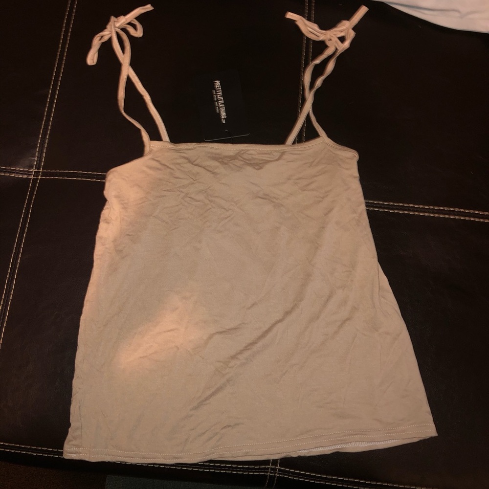 Tank with tie straps